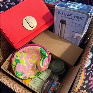 Kate Spade redish purse and a Floral Pouch